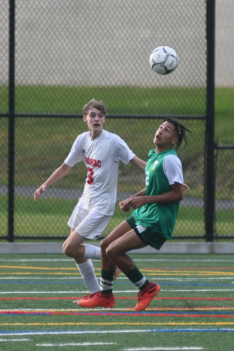 Nick and Makai have their eye on the ball as it is in the air
